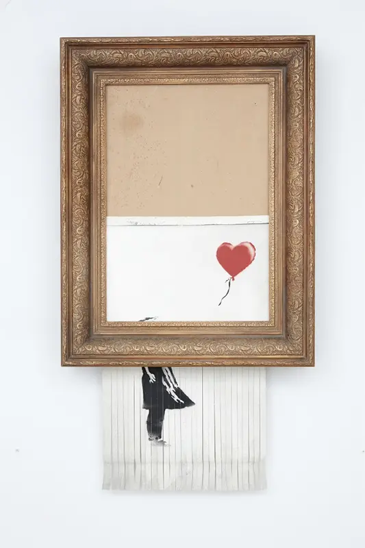 Pintura de Banksy se autodestruye durante una subasta de Sotheby's